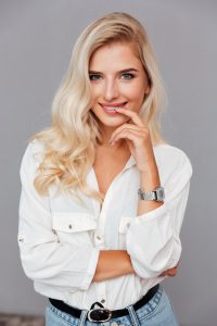 graphicstock close up portrait of beautiful wondered woman looking at camera isolated on a gray background SOesmboBne